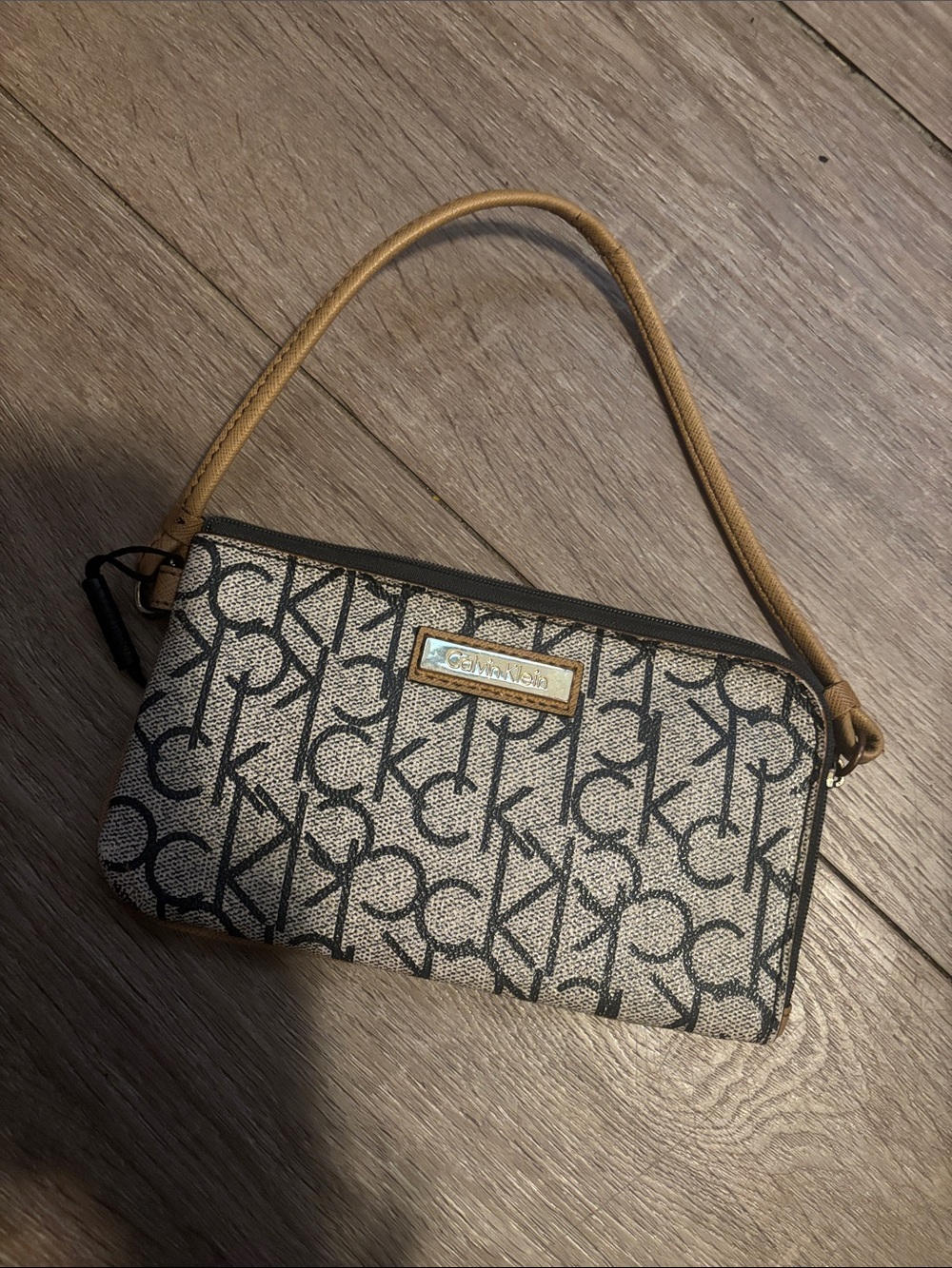 Calvin Klein Monogram Wristlet in Black and Tan